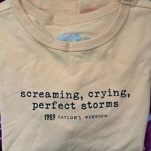 Taylor Swift 1989. Screaming, Crying, Perfect Storms yellow baby tee.